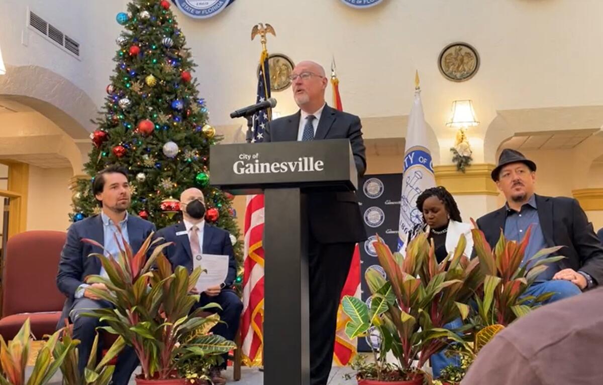 Gainesville Mayor Harvey Ward speaks before swearing in the city's latest commissioners.