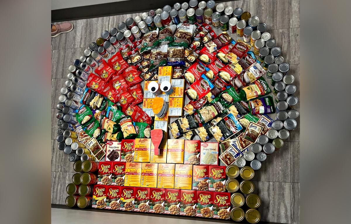 Nursing managers at HCA Florida Ocala Hospital created a smiling turkey food structure to highlight the importance of supporting neighbors in need during the holiday season.