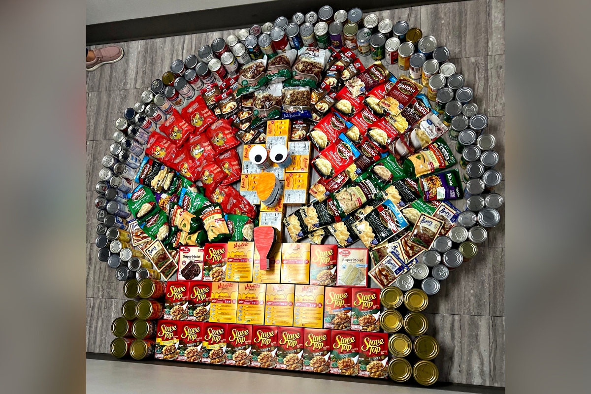 Nursing managers at HCA Florida Ocala Hospital created a smiling turkey food structure to highlight the importance of supporting neighbors in need during the holiday season.