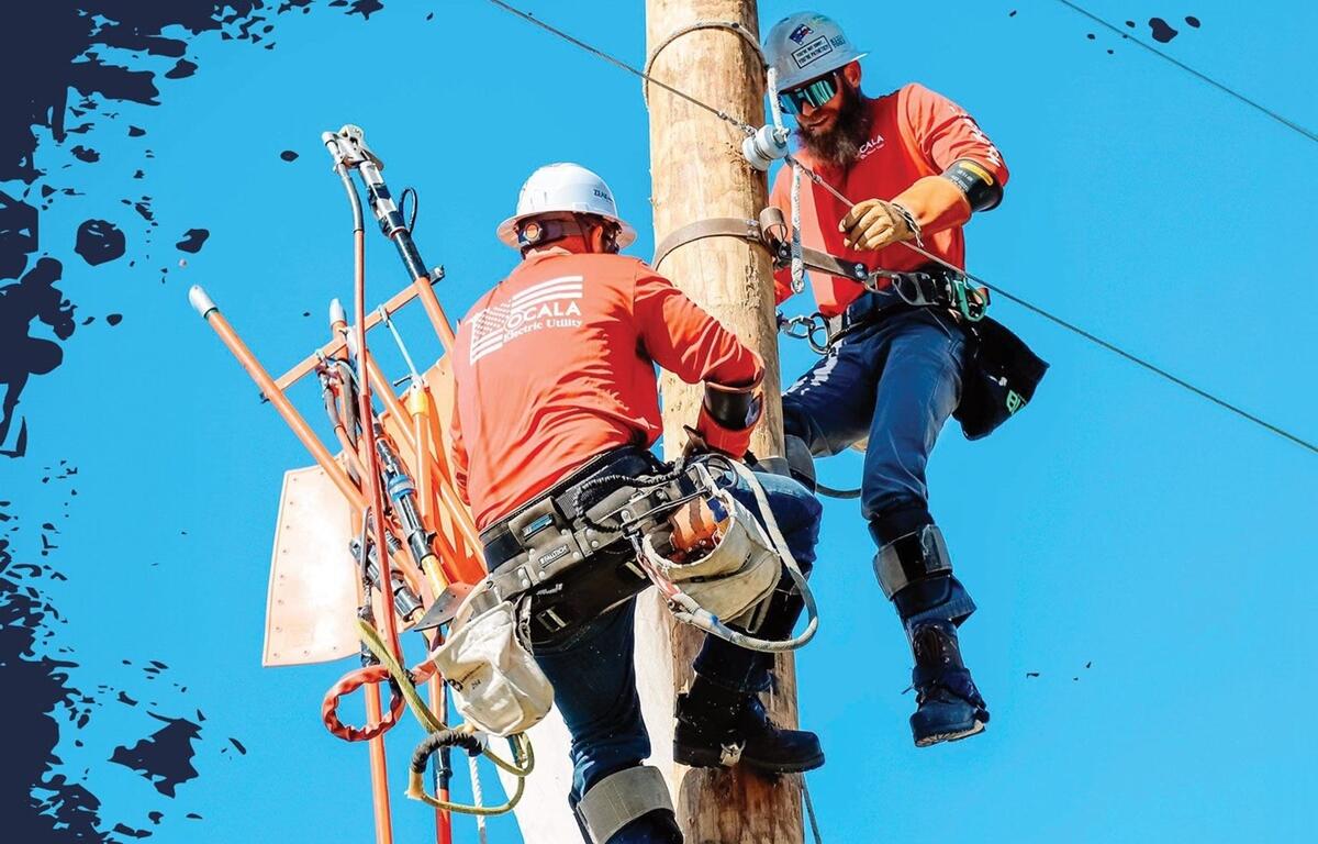 Line workers demonstrate their skills during a pole-climbing event at the Florida Lineman Competition. The 2025 competition, hosted by Ocala Electric Utility, will take place on March 1 at the World Equestrian Center in Ocala.