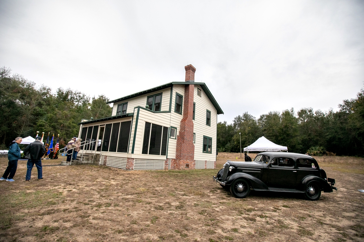 Visitors explore the Ma Barker House on Carney Island during the 90th anniversary of the infamous 1935 shootout.