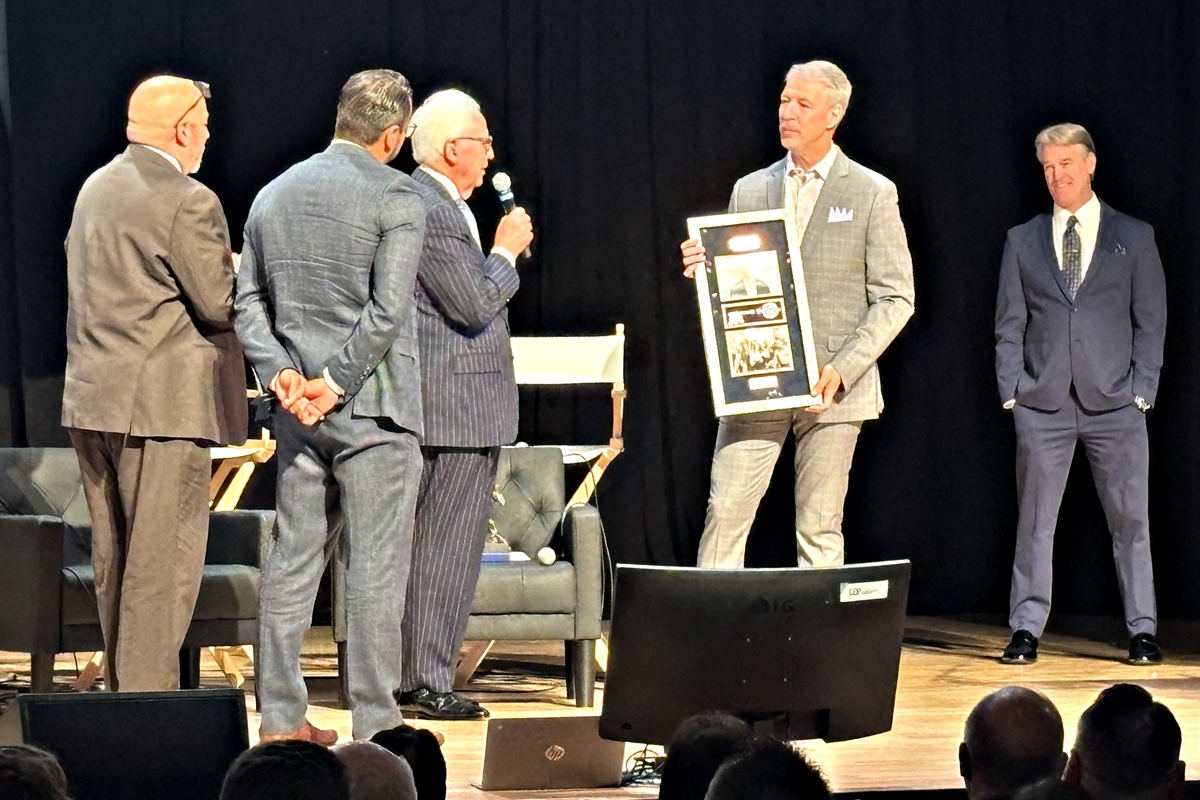 Ocala Metro CEP President and CEO Kevin Sheilley accepts a plaque and key to the city from former Ocala Mayor Kent Guinn and current Mayor Ben Marciano.