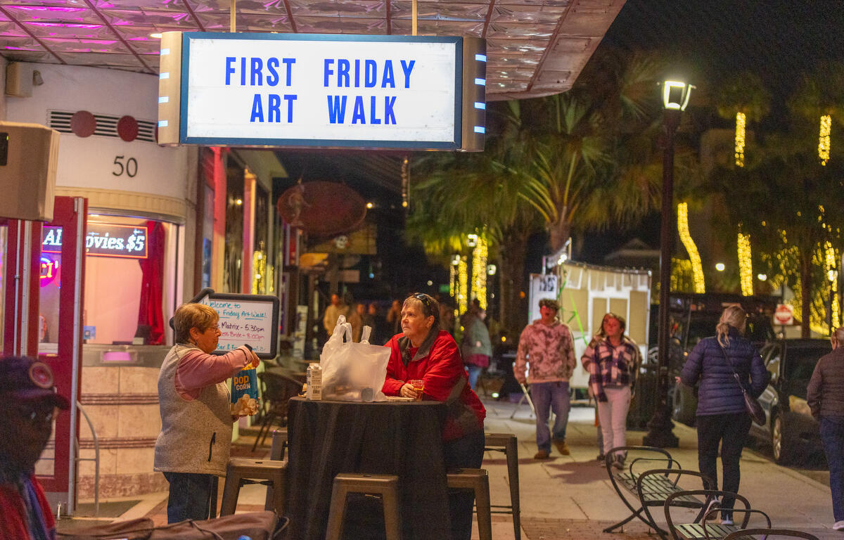 Despite the chilly weather, visitors and artists flocked to downtown Ocala for the First Friday Art Walk, enjoying drinks at the Marion Theatre.
