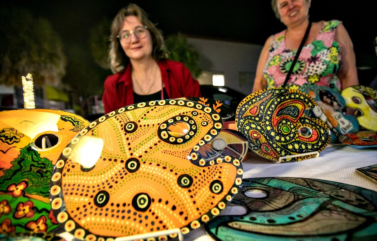 Daniela Drazan, left, and Daniela Banatova during show their resin pallets during First Friday Art Walk