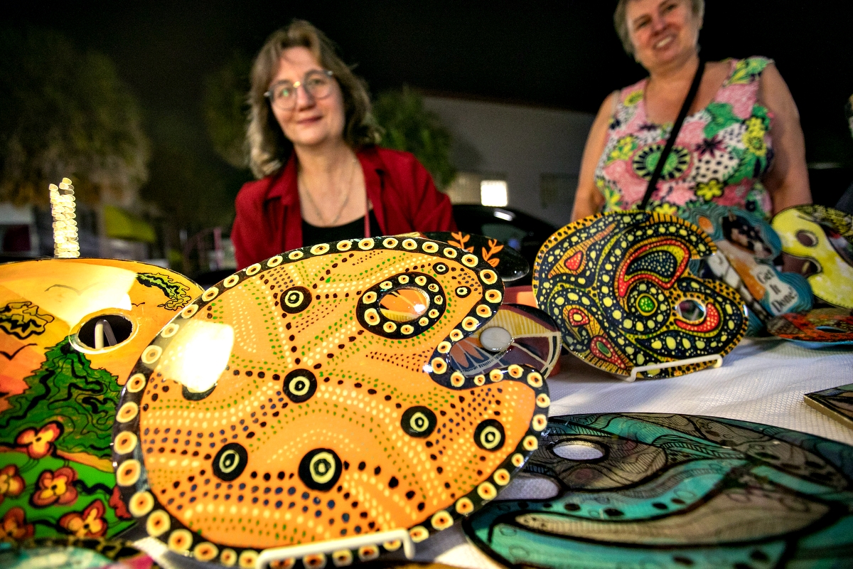 Daniela Drazan, left, and Daniela Banatova during show their resin pallets during First Friday Art Walk