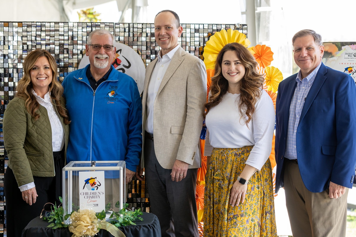 Kristy Rowland, 2024-2025 Annual Giving Campaign chair; Robert Haight, CEO and president of United Way of Marion County; Alan Keesee, CEO of HCA Florida Ocala Hospital and United Way of Marion County Executive Committee board chair; Kaitlyn Wilson-Butler, director of communications and community engagement for HCA Florida Ocala Hospital and HCA Florida West Marion Hospital; and Bill Thompson, manager of communications and community engagement for HCA Florida Ocala Hospital and HCA Florida West Marion Hospital, gather in support of the inaugural Children’s Charity Classic.