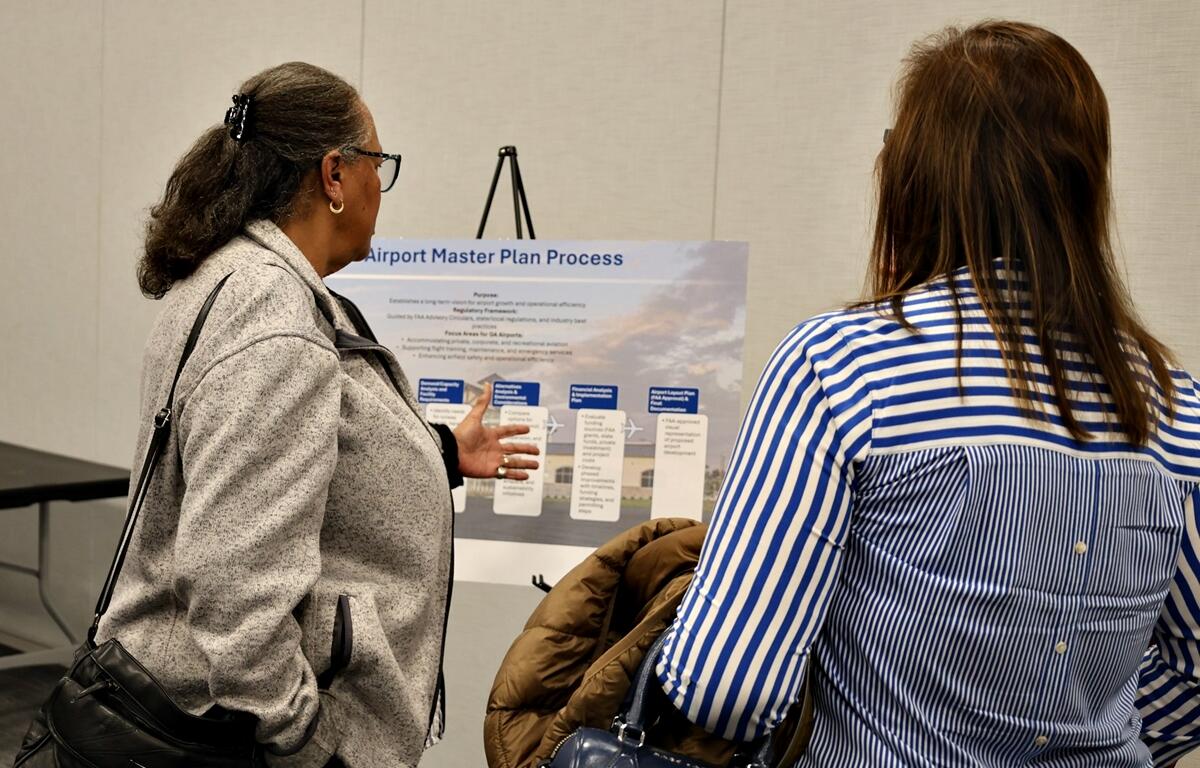 Residents review the proposed master plan for Ocala International Airport during a public meeting on Feb. 19 at the Mary Sue Rich Community Center.