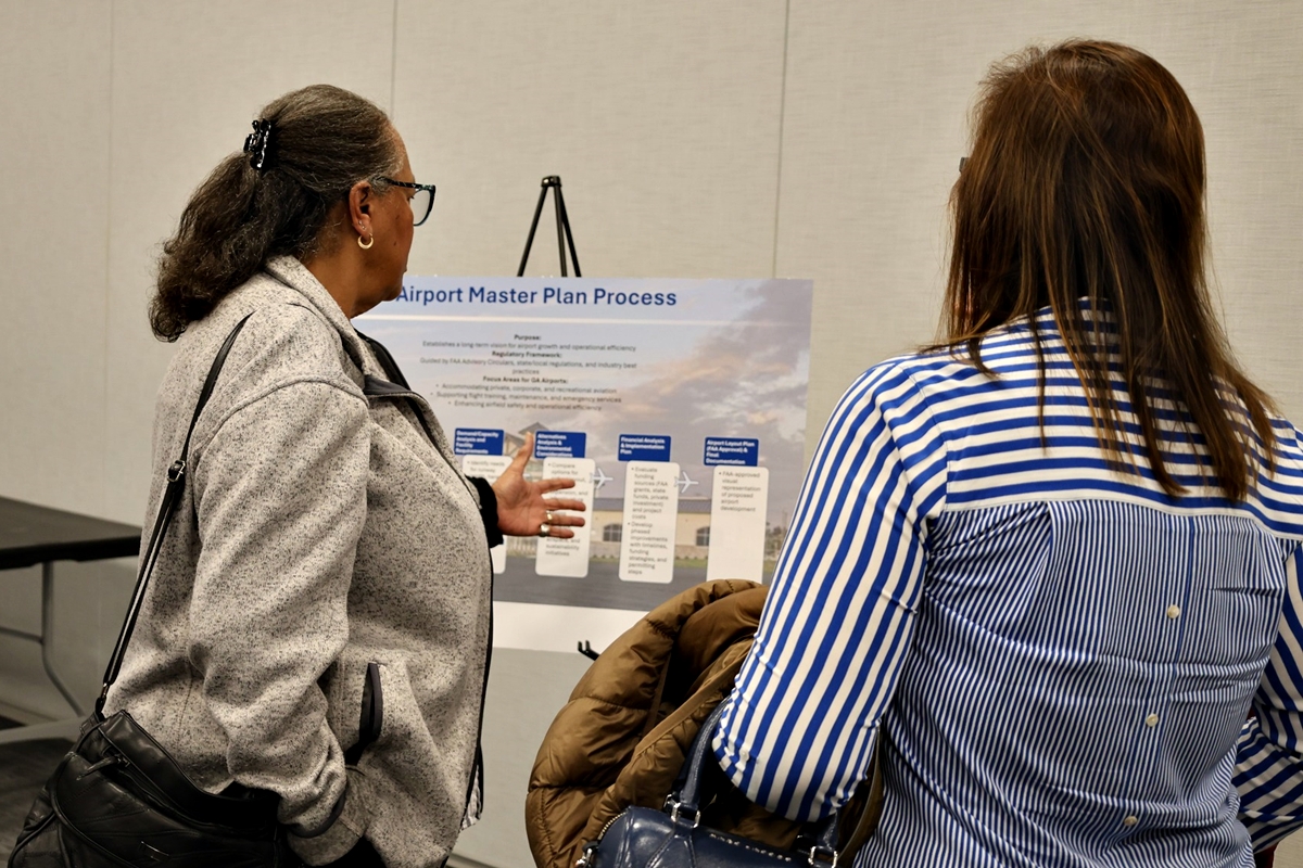 Residents review the proposed master plan for Ocala International Airport during a public meeting on Feb. 19 at the Mary Sue Rich Community Center.