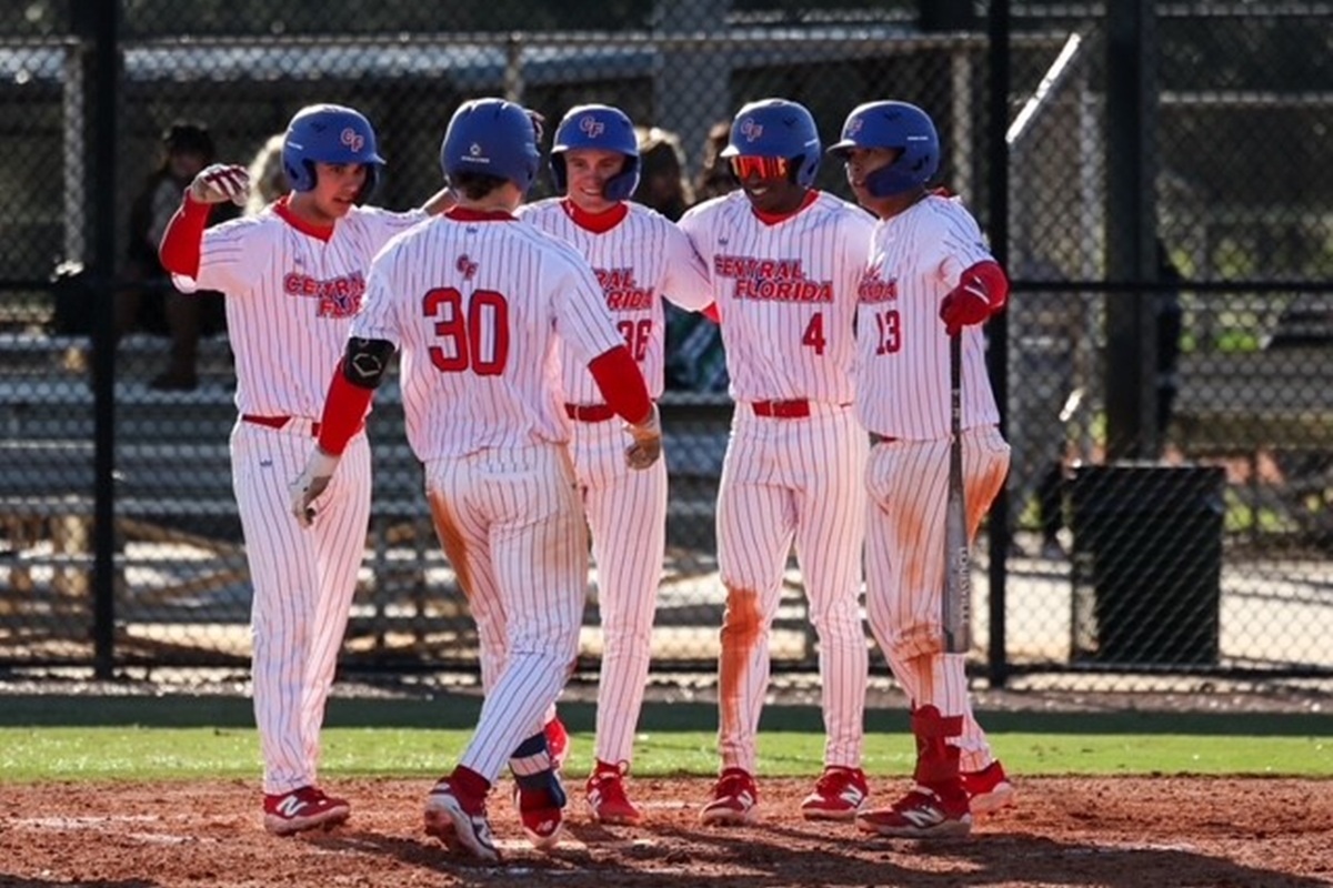 Dawson Harman celebrates with teammates after scoring the game-winning run in CF's thrilling 13-12 walk-off victory over South Florida State College.