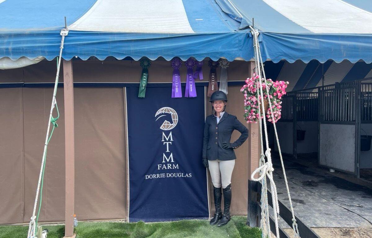Dorrie Douglas, an Ocala-based rider, has been a fixture at the World Equestrian Center and HITS, competing at the upper levels in both show jumping and show hunters. She is pictured in front of the MTM barn at HITS Post Time Farm on Feb. 6, 2025.