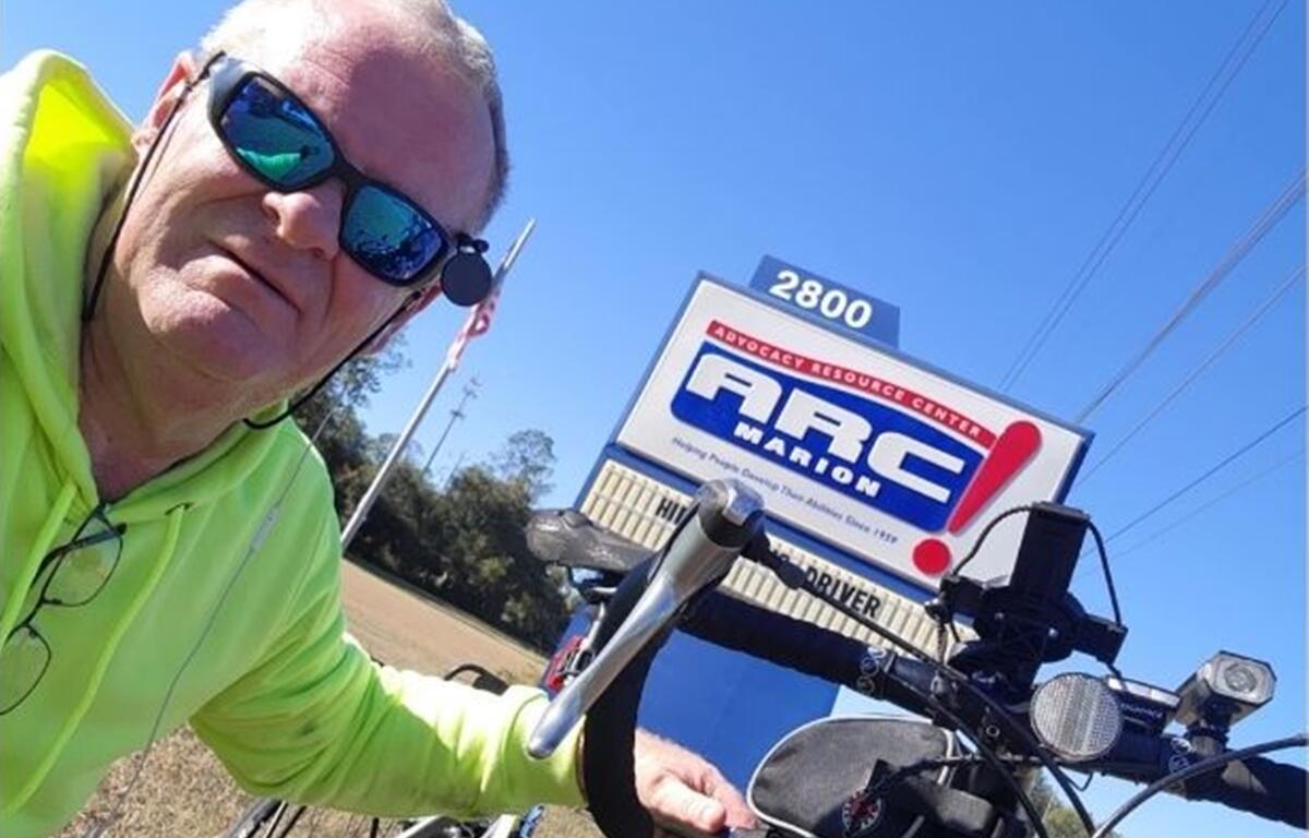 Robert Howie, a retired Marion County Sheriff’s Office deputy, prepares for his 1,000-mile cycling journey from Ocala to Key West and back in support of The Arc Marion. The ride, scheduled for Feb. 17-28, aims to raise funds and awareness for individuals with developmental disabilities.