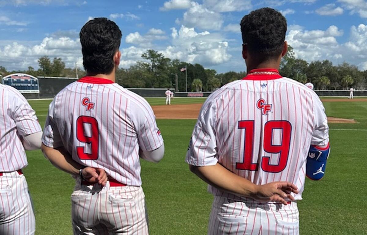 Players from the College of Central Florida stand for the national anthem before their Citrus Conference opener at Goodlett Field in Ocala, FL, on Thursday, Feb. 15, 2025.