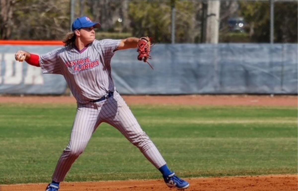 College of Central Florida shortstop Logan Chapman makes a strong throw to first base during Tuesday night's game against Tallahassee State College in Tallahassee. Chapman played a key role in the Patriots' 12-9 comeback win, including a game-tying home run in the ninth inning.