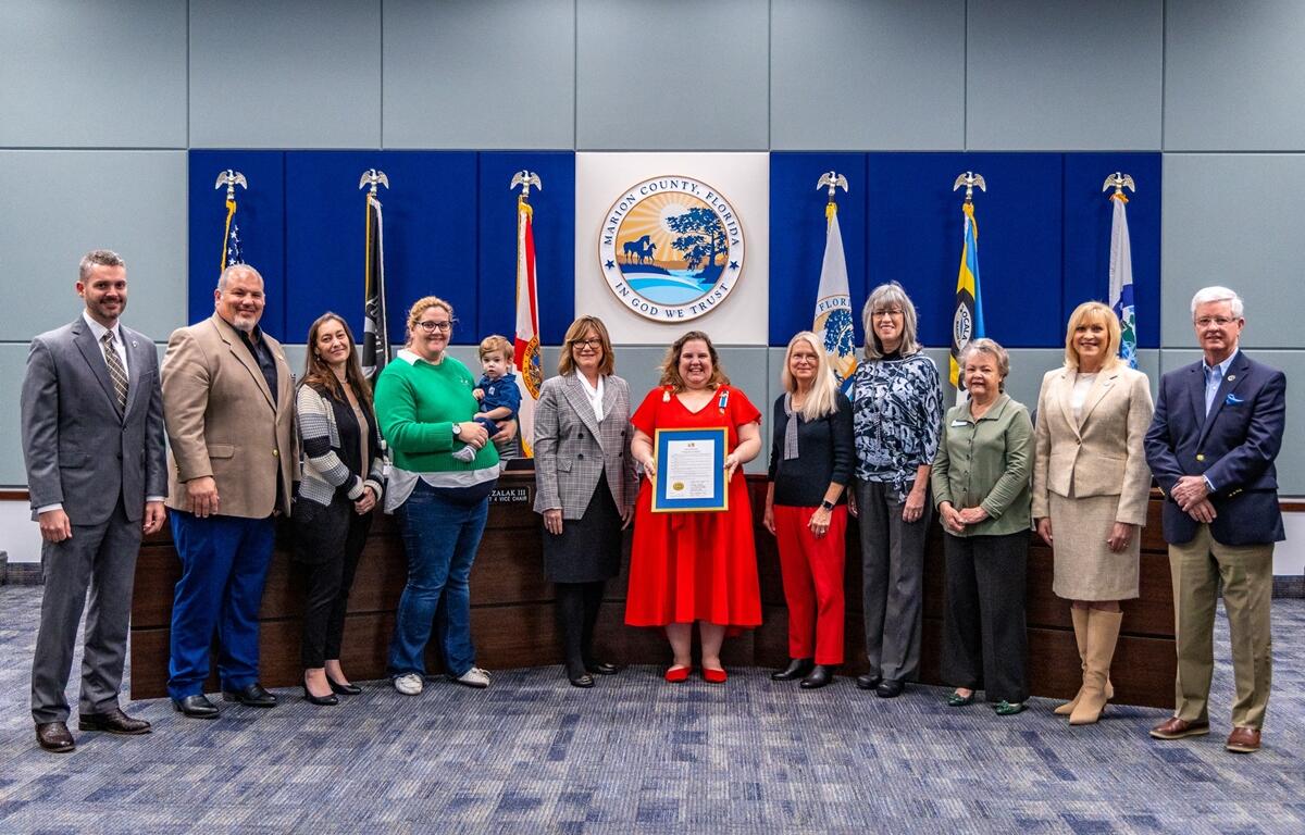 Marion County Commissioners present a proclamation to members of the Ocala Chapter of the Daughters of the American Revolution, declaring March as National DAR Month in honor of the chapter’s 100th anniversary, during a meeting on Tuesday.