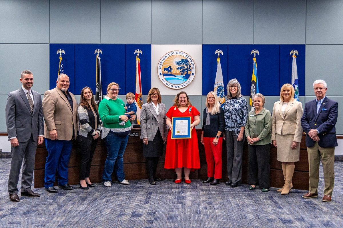 Marion County Commissioners present a proclamation to members of the Ocala Chapter of the Daughters of the American Revolution, declaring March as National DAR Month in honor of the chapter’s 100th anniversary, during a meeting on Tuesday.