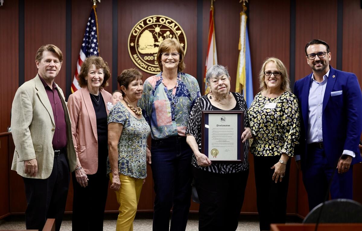 Ocala Mayor Ben Marciano presents a proclamation to Leona Asta on Feb. 4, 2025, honoring the Ocala Art Group’s 75th anniversary and its enduring impact on the city’s arts community.