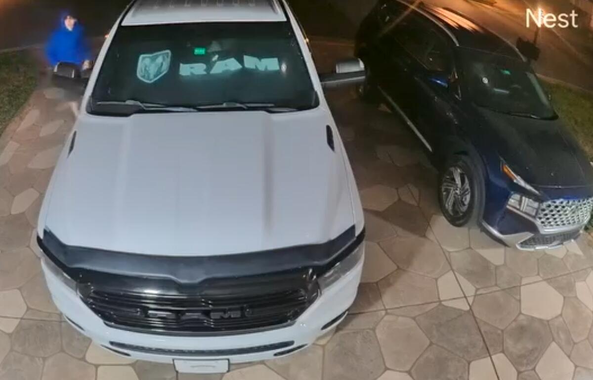 One of the two individuals is seen walking around a car in the 9000 block of SE 120th Loop on February 14th. The Marion County Sheriff's Office is asking for public help identifying the suspects involved in recent vehicle break-ins.