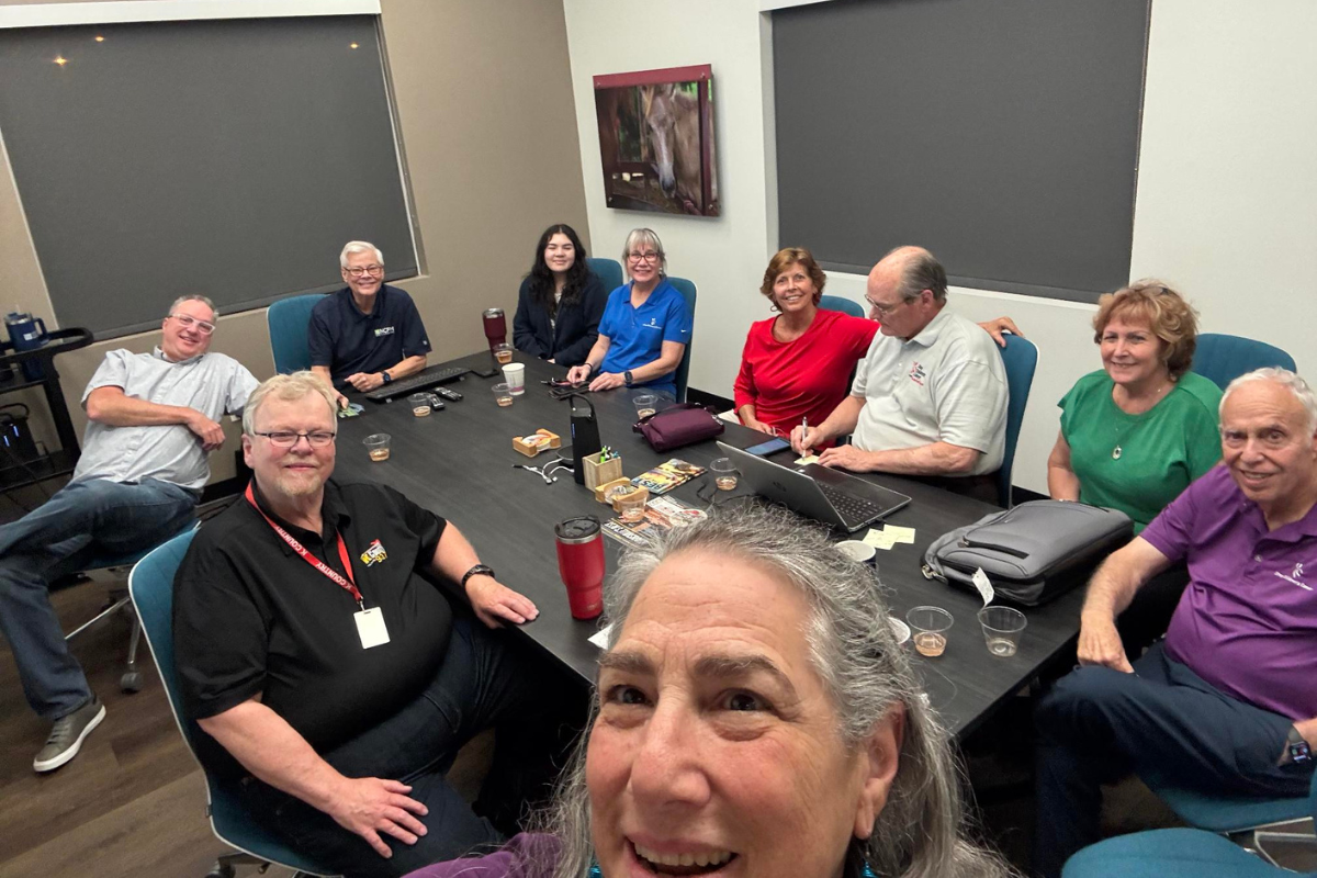 North Central Florida Media Group celebrates the first day of Bear-A-Thon donations with Laurel Freeman (center) and Howard Freeman (far right).