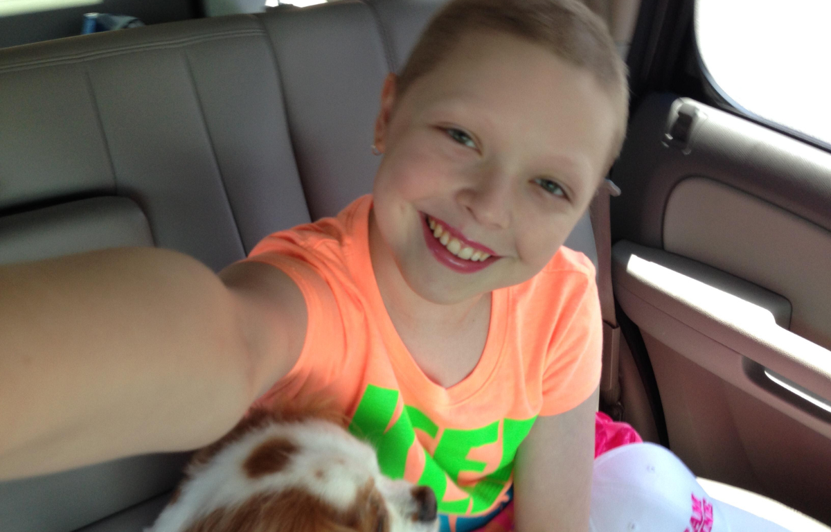 Blaine Baxley, now 23, celebrates nearly a decade in remission after surviving leukemia twice. She now advocates for cancer awareness and supports fundraising efforts for young patients.