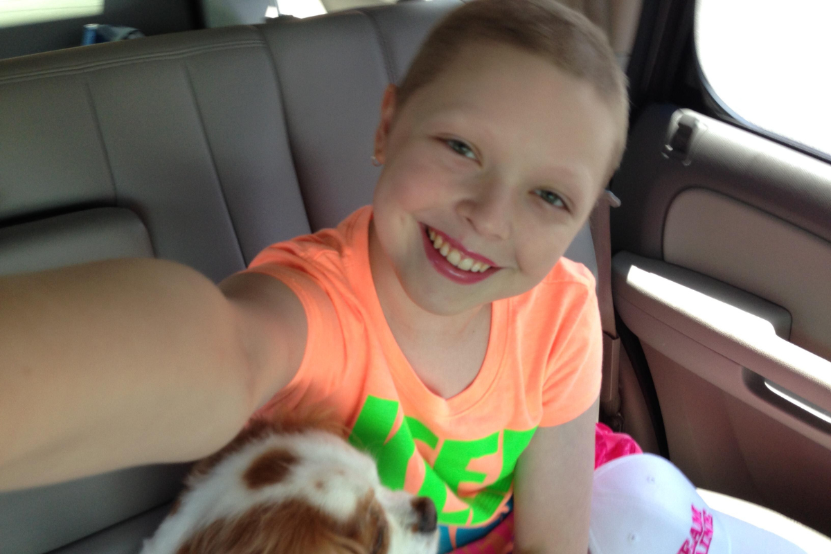 Blaine Baxley, now 23, celebrates nearly a decade in remission after surviving leukemia twice. She now advocates for cancer awareness and supports fundraising efforts for young patients.