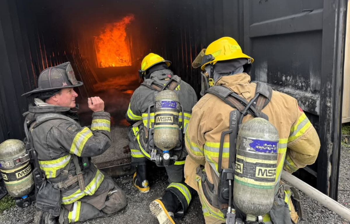 Fire rescue workers show Leadership Ocala Marion Class XXXVIII how procedures such as extinguishing fires are done.