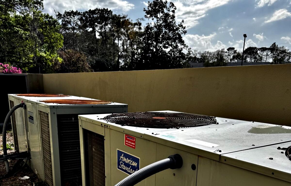 A row of aging air-conditioning units at The Civic, with 14 still needing replacement as part of ongoing facility upgrades. The theater is seeking community support to fund critical repairs.