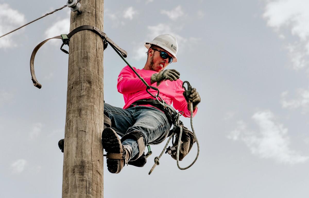 Corey attempts the egg climb at the Florida Lineman's Rodeo.