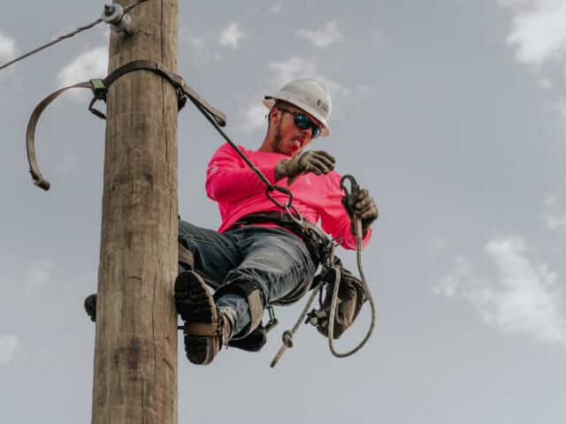 Corey attempts the egg climb at the Florida Lineman's Rodeo.