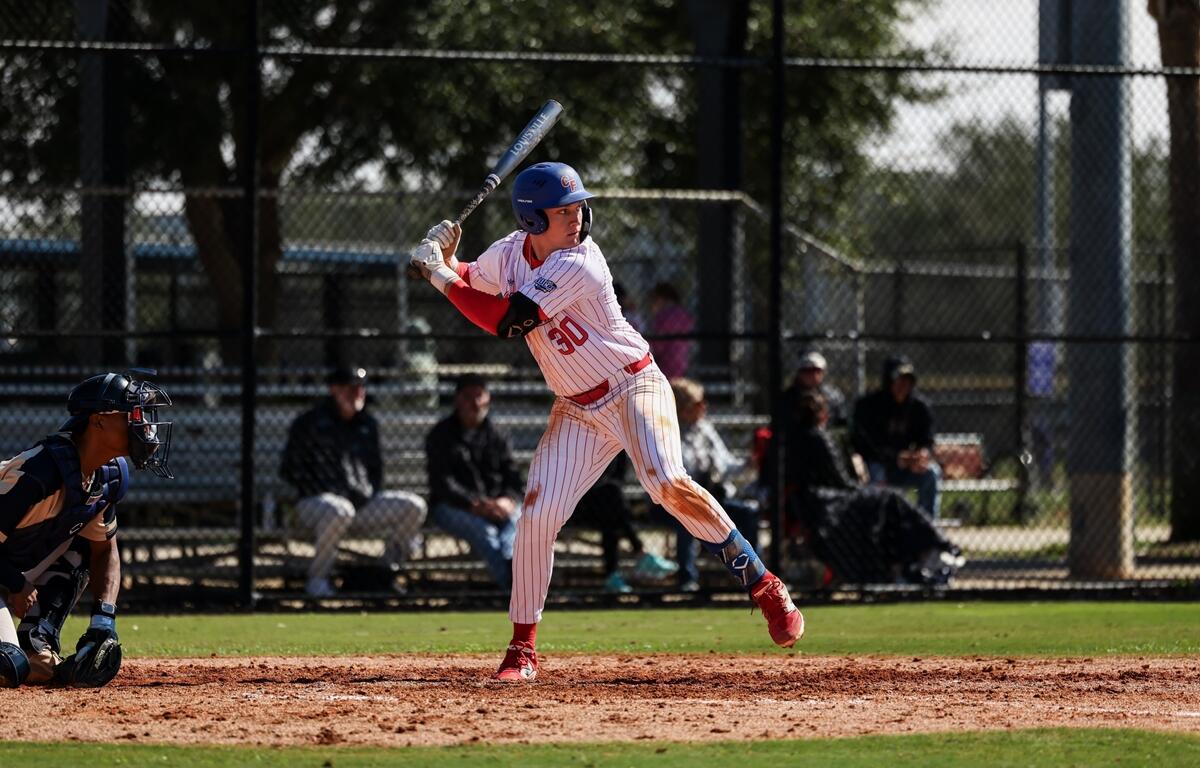 Dawson Harman of the College of Central Florida prepares to swing during a game against Polk State at Goodlett Field in Ocala, Fla., on Saturday. Harman contributed with two doubles, two runs scored, and an RBI in the Patriots’ 9-0 victory.