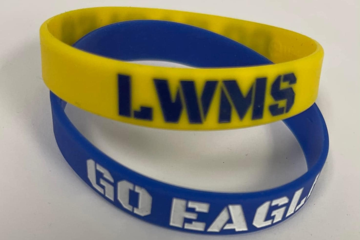 Silicone wristbands featuring “LWMS” and “Go Eagles” represent school spirit at Lake Weir Middle School. The Marion County Public School Board approved Skanska USA to construct the Lake Weir Middle School replacement on March 25, 2025.