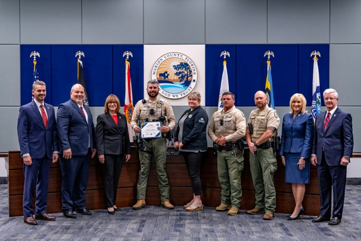 Florida Fish and Wildlife Conservation Commission Officer Wade Constance receives the Litter Hero Award from the Marion County Commission on March 18, 2025, for his investigative work that led to the arrest of an individual responsible for illegally dumping over 5,000 pounds of trash.