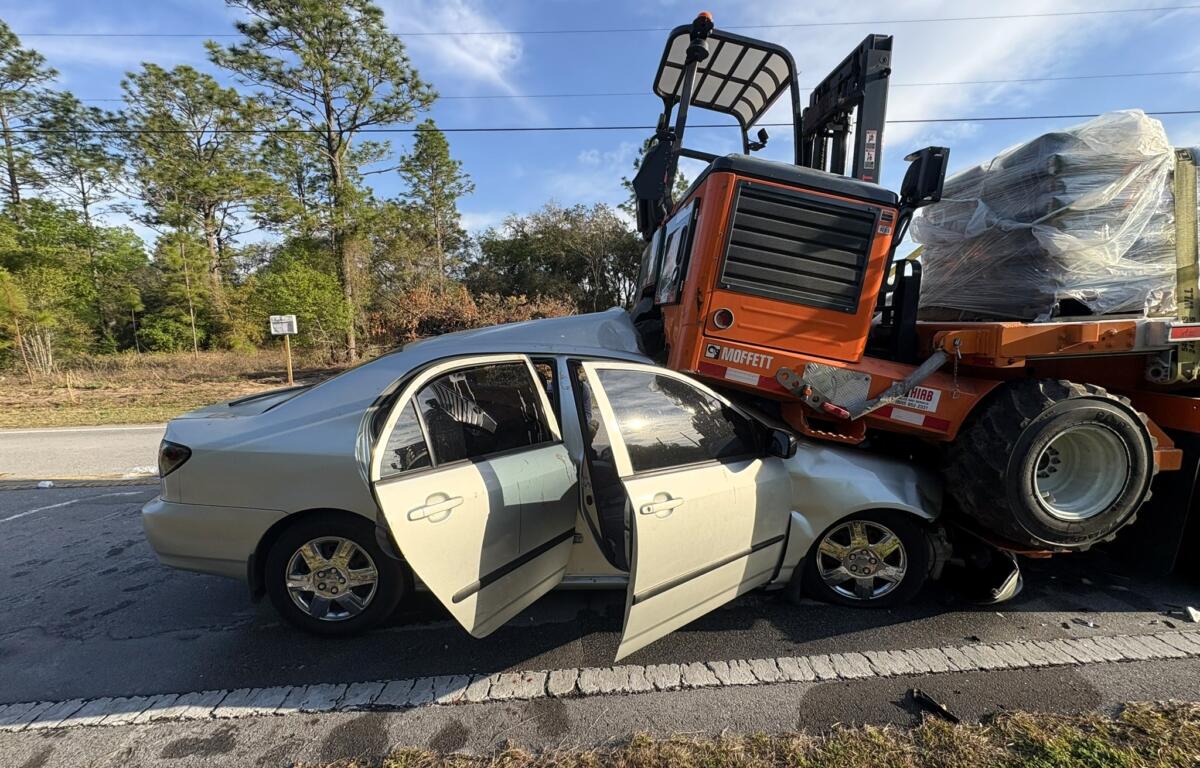 The car ended up underneath the tractor-trailer.