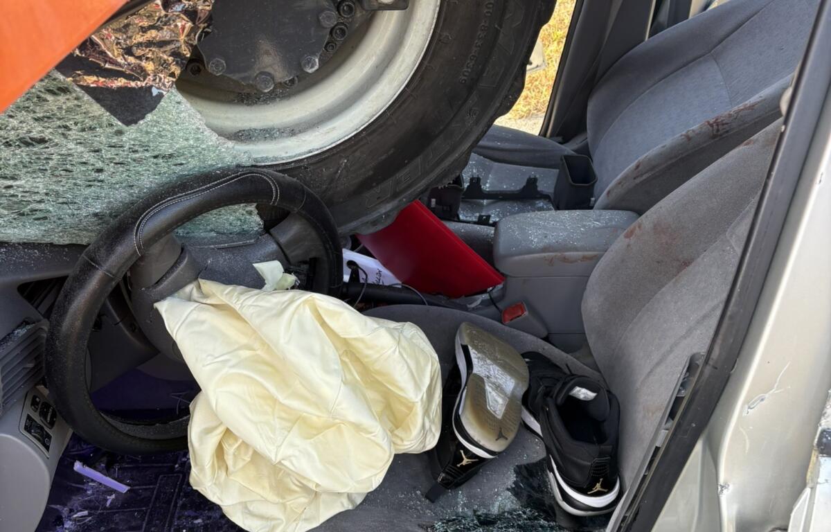 The sedan ended up underneath the tractor-trailer.