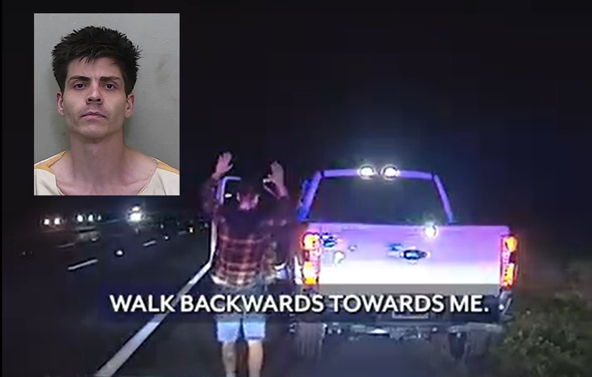 Ernest Van Damme surrenders to police on I-75 after allegedly stealing a Ford F-250 from Gary Yeomans Ford and leading officers on a high-speed chase.