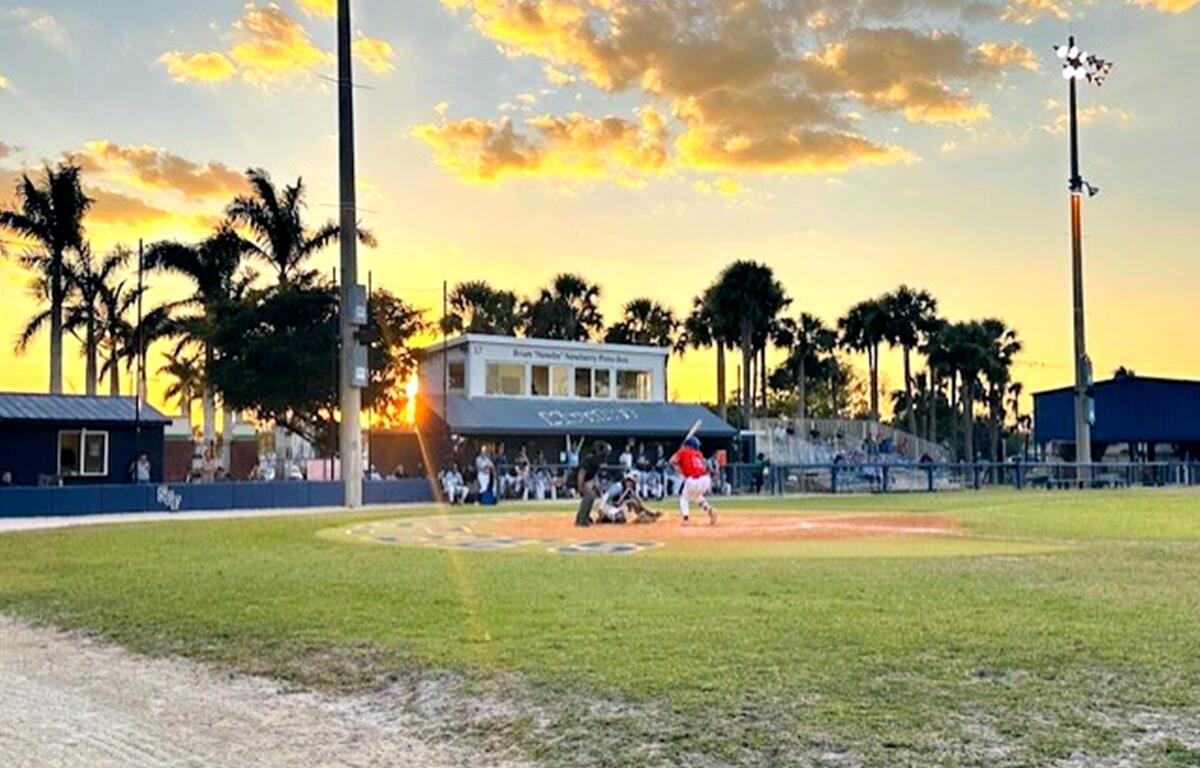Victor Martinez takes a pitch during a sunset matchup between the College of Central Florida and State College of Florida on Thursday, March 28, 2025, in Bradenton, Fla.