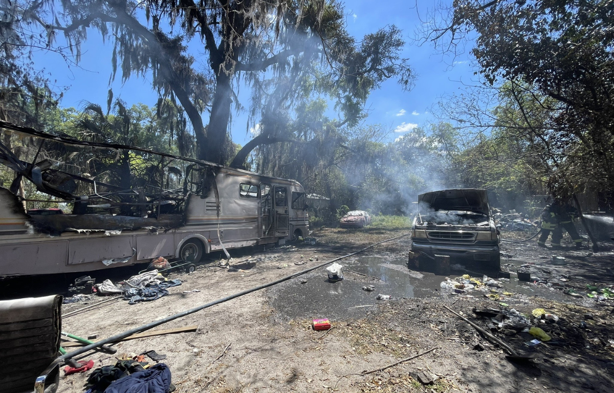 Pictures show the close proximity of the van to the RV.