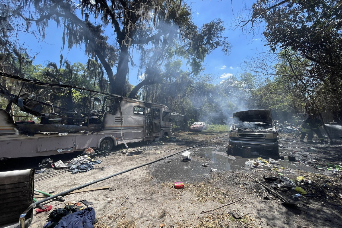 Pictures show the close proximity of the van to the RV.