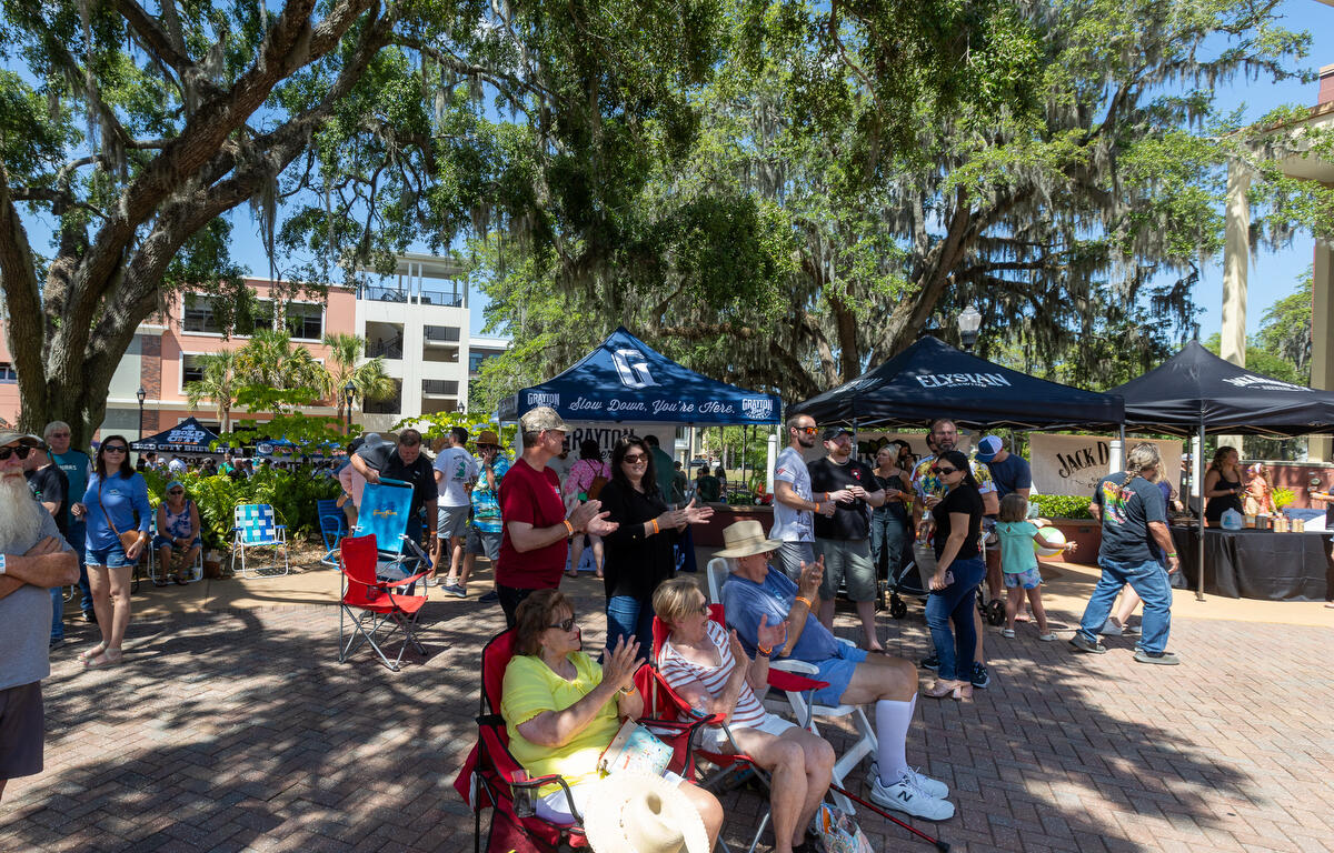 Fans enjoy the shade during the 11th Annual Brick City Beer and Wine Festival at Citizen Circle in Ocala, FL on Saturday, April 19, 2025. Courtesy: Alan Youngblood/352today