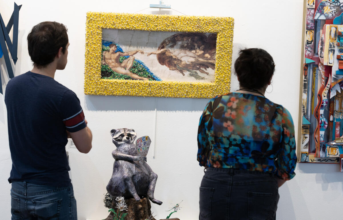 Visitors check out the new exhibit at Brick City Center for the Arts Upcycled Art from Waste to Wonder downtown during First Friday Art Walk in Ocala, FL on Friday, April 4, 2025.