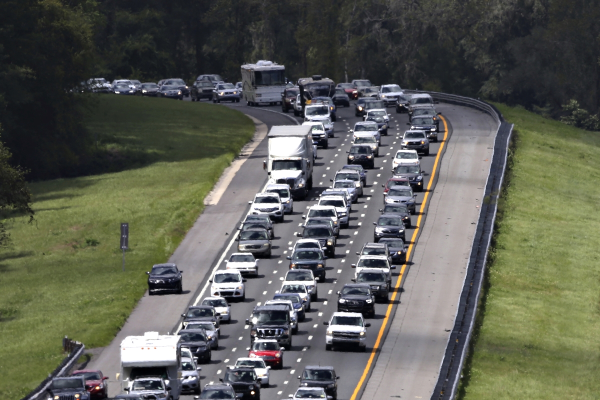 Traffic backs up on Interstate 75, highlighting growing infrastructure strain as Marion County officials consider increasing transportation impact fees to meet future road needs.
