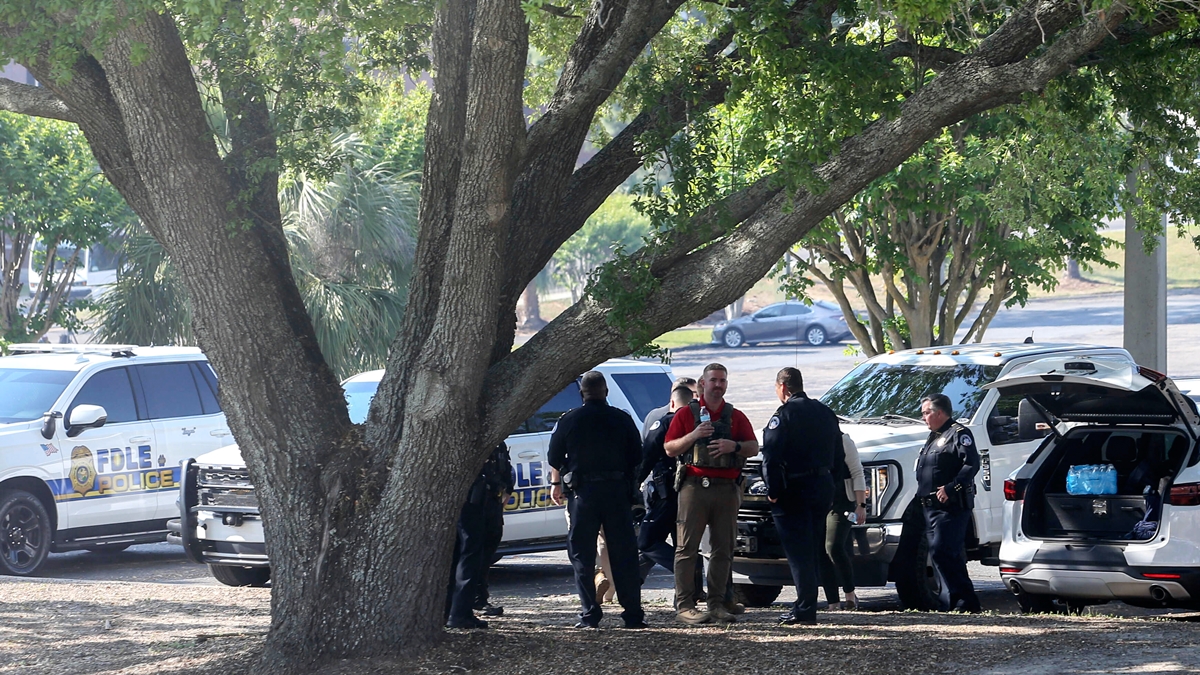 Law enforcement officers gather after a shooting at Florida State University in Tallahassee, Fla., Thursday, April 17, 2025. Courtesy: Gary McCullough/AP Photo