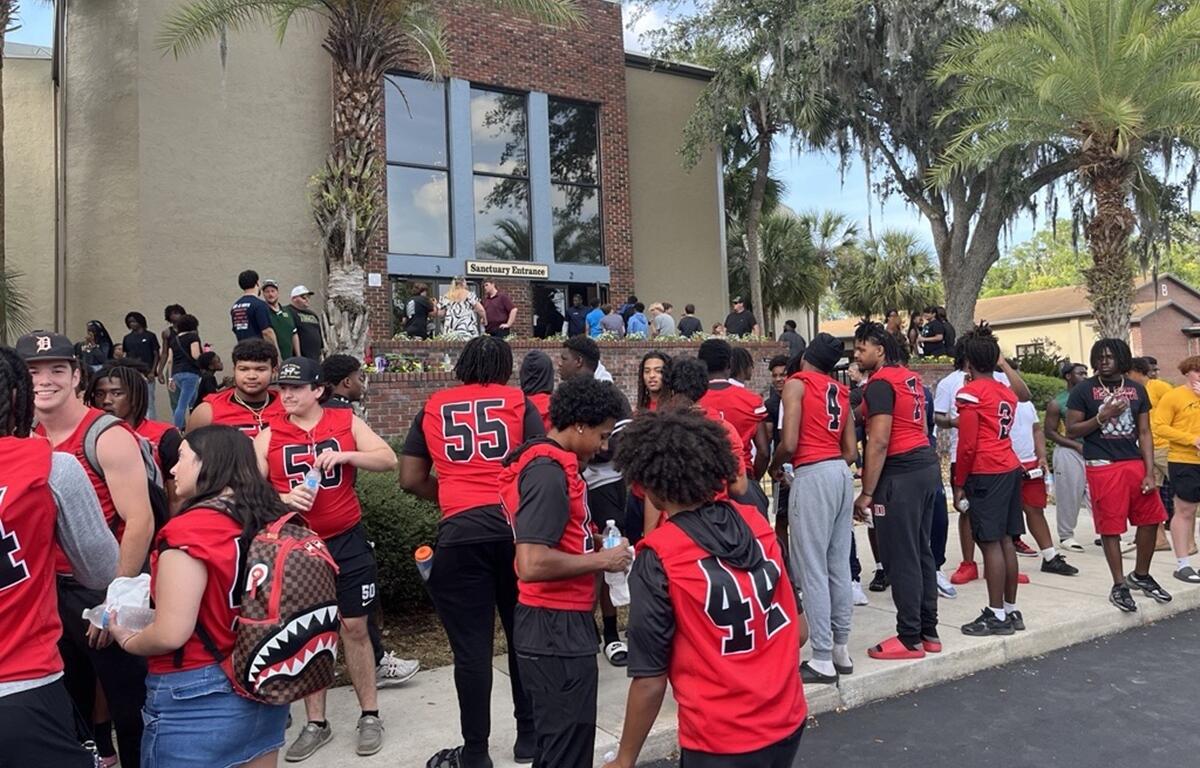 Student-athletes from Dunnellon High School gather outside Ocala First Assembly of God during the Fellowship of Christian Athletes Night of Champions on April 25, 2025, in Ocala, FL.