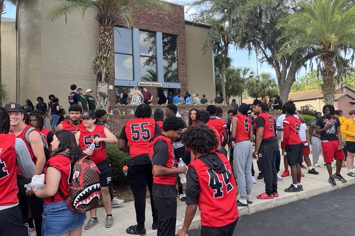 Student-athletes from Dunnellon High School gather outside Ocala First Assembly of God during the Fellowship of Christian Athletes Night of Champions on April 25, 2025, in Ocala, FL.
