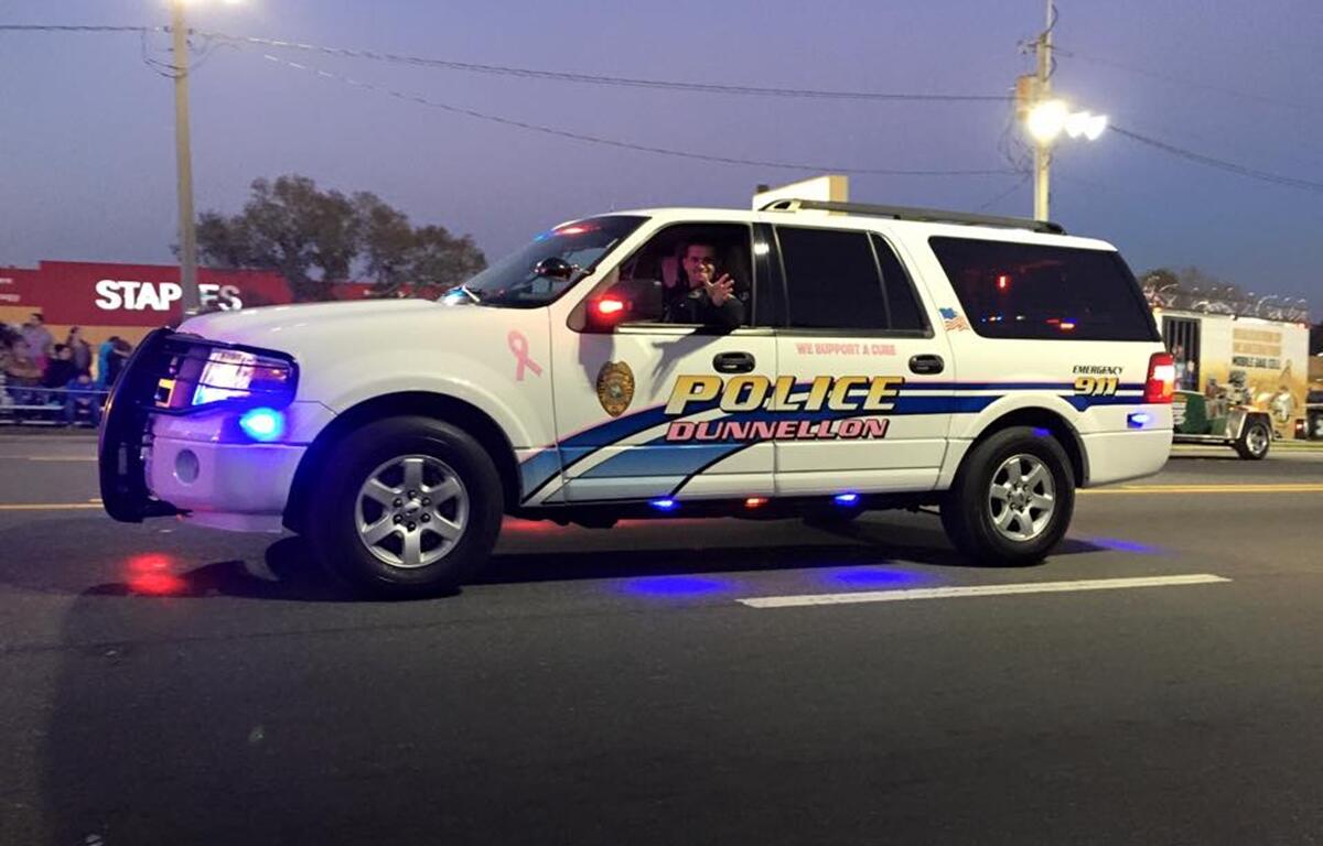 A Dunnellon Police Department vehicle participates in the Ocala Christmas Parade. The city recently approved an agreement for additional MCSO deputies to assist with law enforcement.