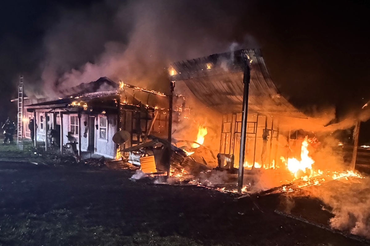 A structure in Summerfield is engulfed in flames late Tuesday night as Marion County Fire Rescue crews work to contain the blaze.