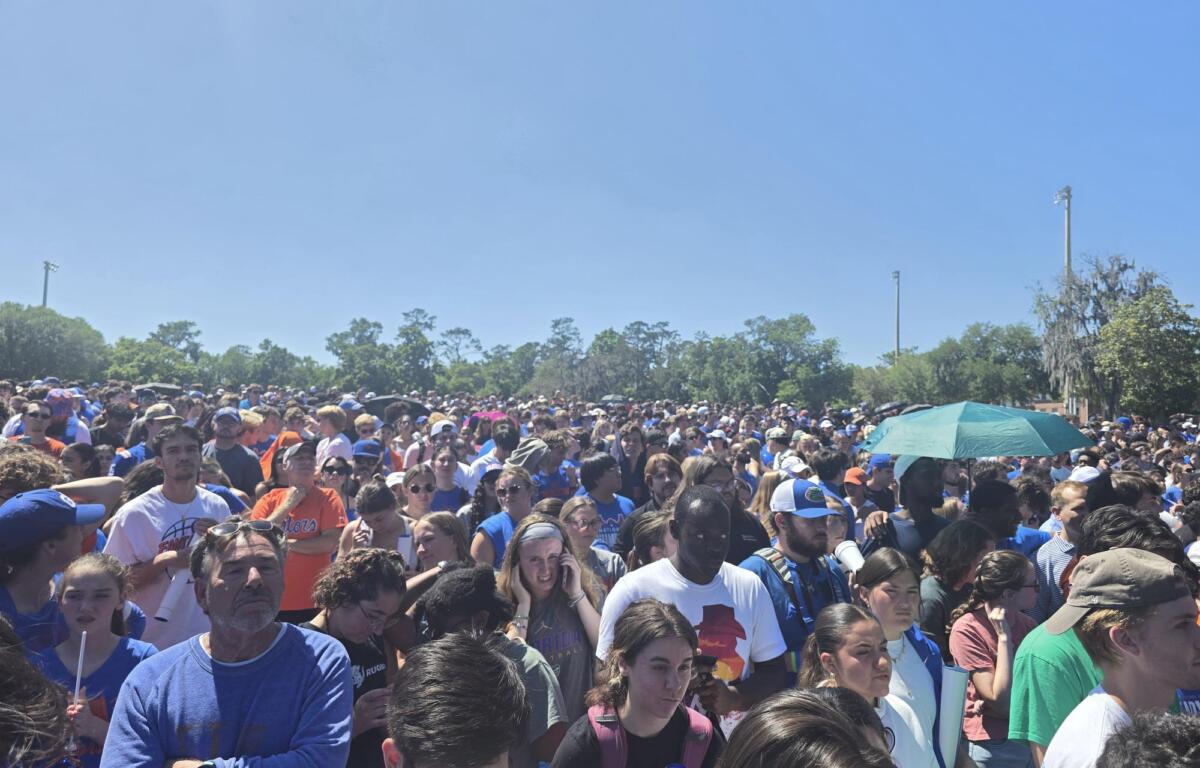 Fans had to wait a little while to welcome back the national champions.