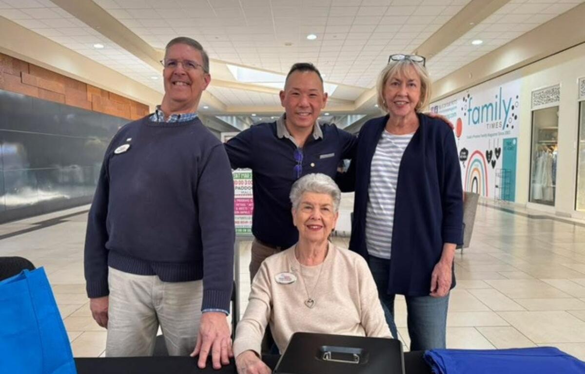 Rotarians Herb Silverman, Tony Park, and Phyllis Silverman plus a friend