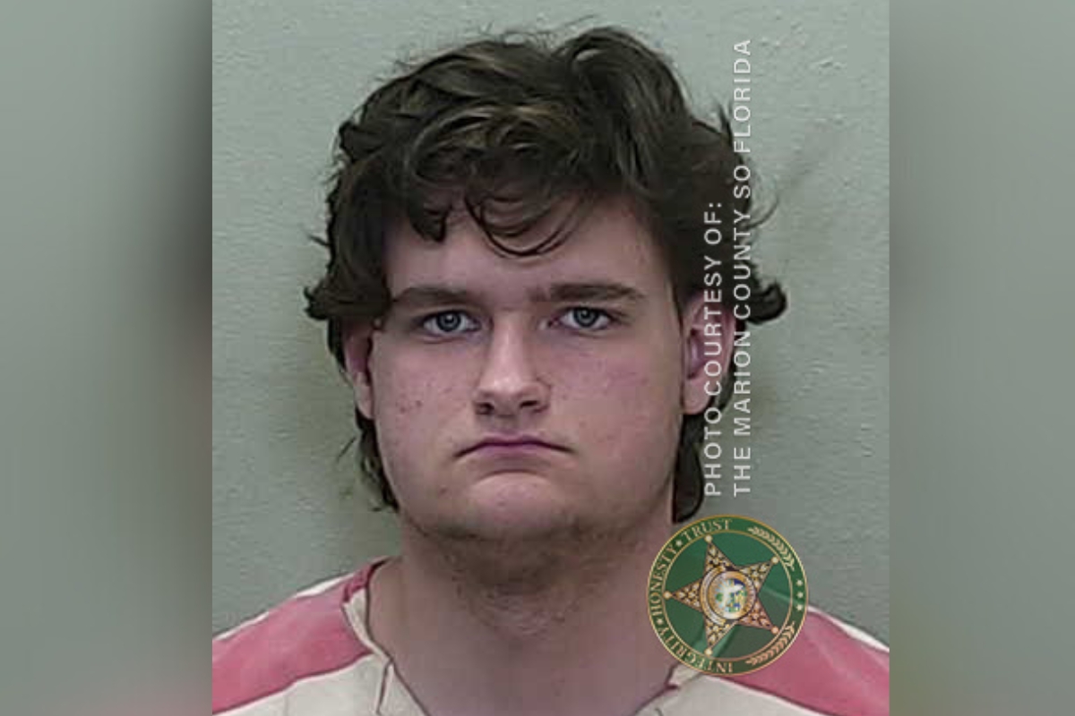 Christian Scribben, 17, is shown in a booking photo after his arrest on April 29, 2025, in Marion County, FL, for charges related to directing child sexual performances via Roblox.