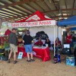 Visitors stop by the Save Our Rural Areas booth during the Marion County Farmland Preservation Festival at Stirrups and Strides on April 12.