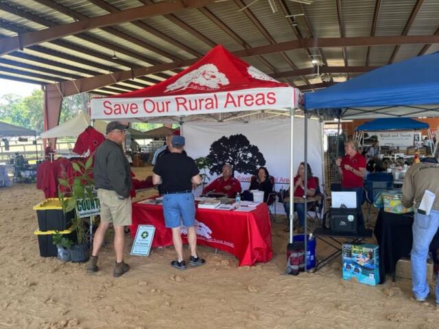 Visitors stop by the Save Our Rural Areas booth during the Marion County Farmland Preservation Festival at Stirrups and Strides on April 12.